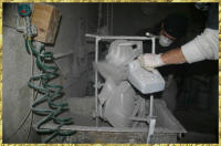 Coating the slurry with sand